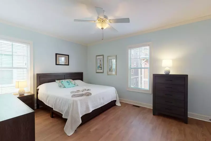large 2nd floor bedroom with queen bed