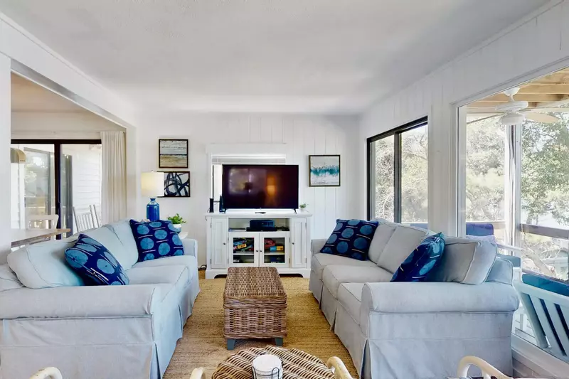 The main room has a large flat screen smart TV, perfect for the big game or your favorite series