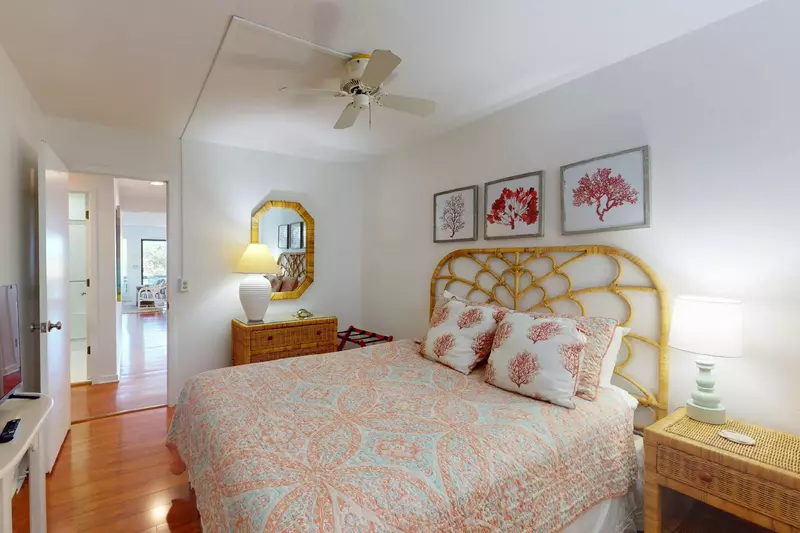 The second bedroom features a queen sized bed