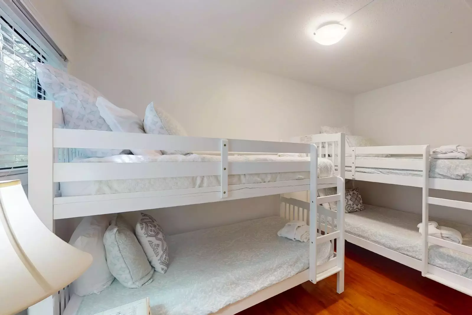 The third bedroom has 2 bunks, 4 twin beds, perfect for the kids