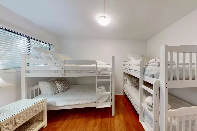 The kids/teens will love this bunk room with it's own tv