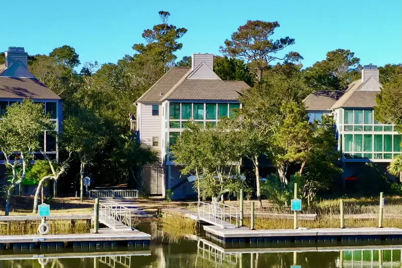 This waterfront condo on Bald Head Creek has a large shared dock just outside your door!