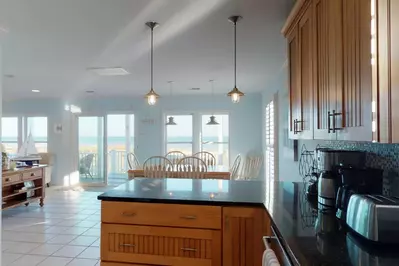 After cooking dinner with your family you can choose to sit on the inside dining room table or the outside one, either way you get a beautiful view