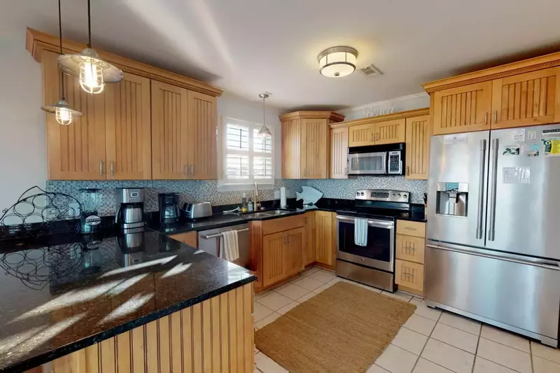 Kitchen and Breakfast Bar area is fully equipped with everything you need to 'dine in'