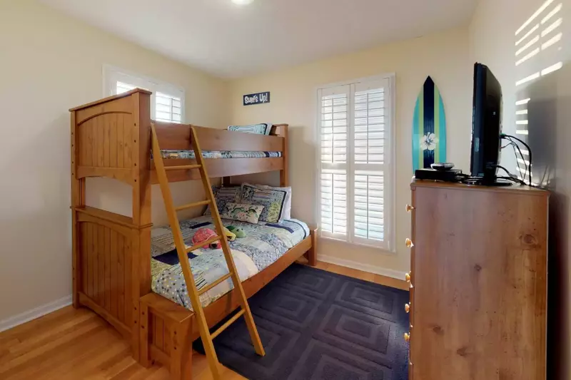 The top floor bunk bed room comes with a TV with cable