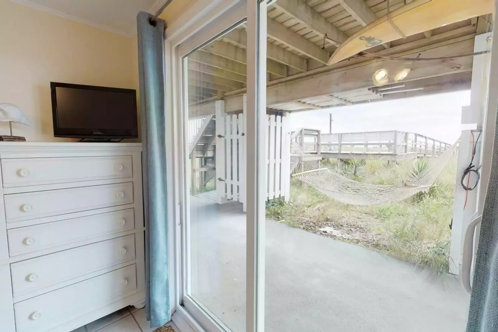 Go chill on the hammock right outside the bedroom or walk up to the deck and to the beach