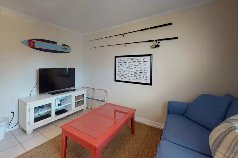 Ground Floor Game Room has a Large Screen TV, Wii, and a Pull Out Sofa Bed