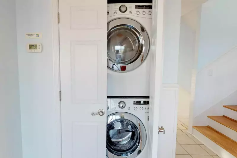 The home includes a laundry room so you can throw your beach towels in to use them again and again
