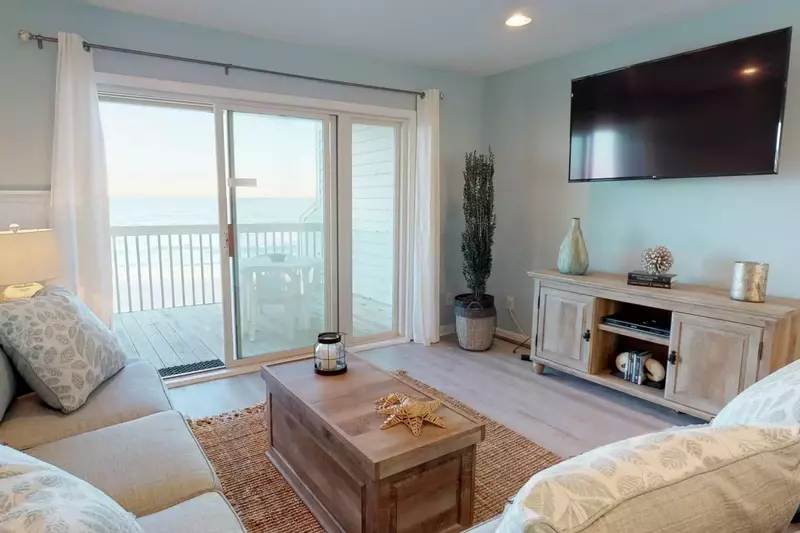 Enjoy the big game on a large screen Smart TV in the main living space