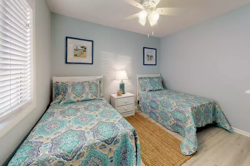 The second bedroom has 2 comfortable twin beds