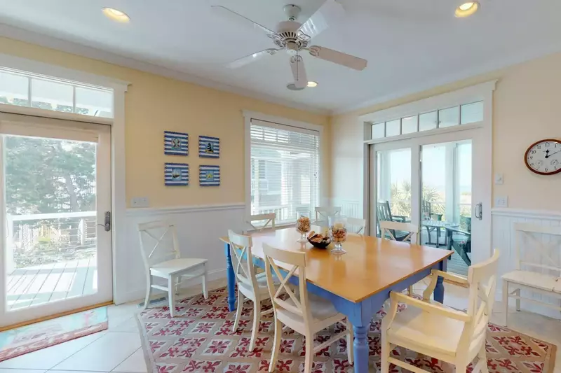 A large dining room table has enough seating for 8