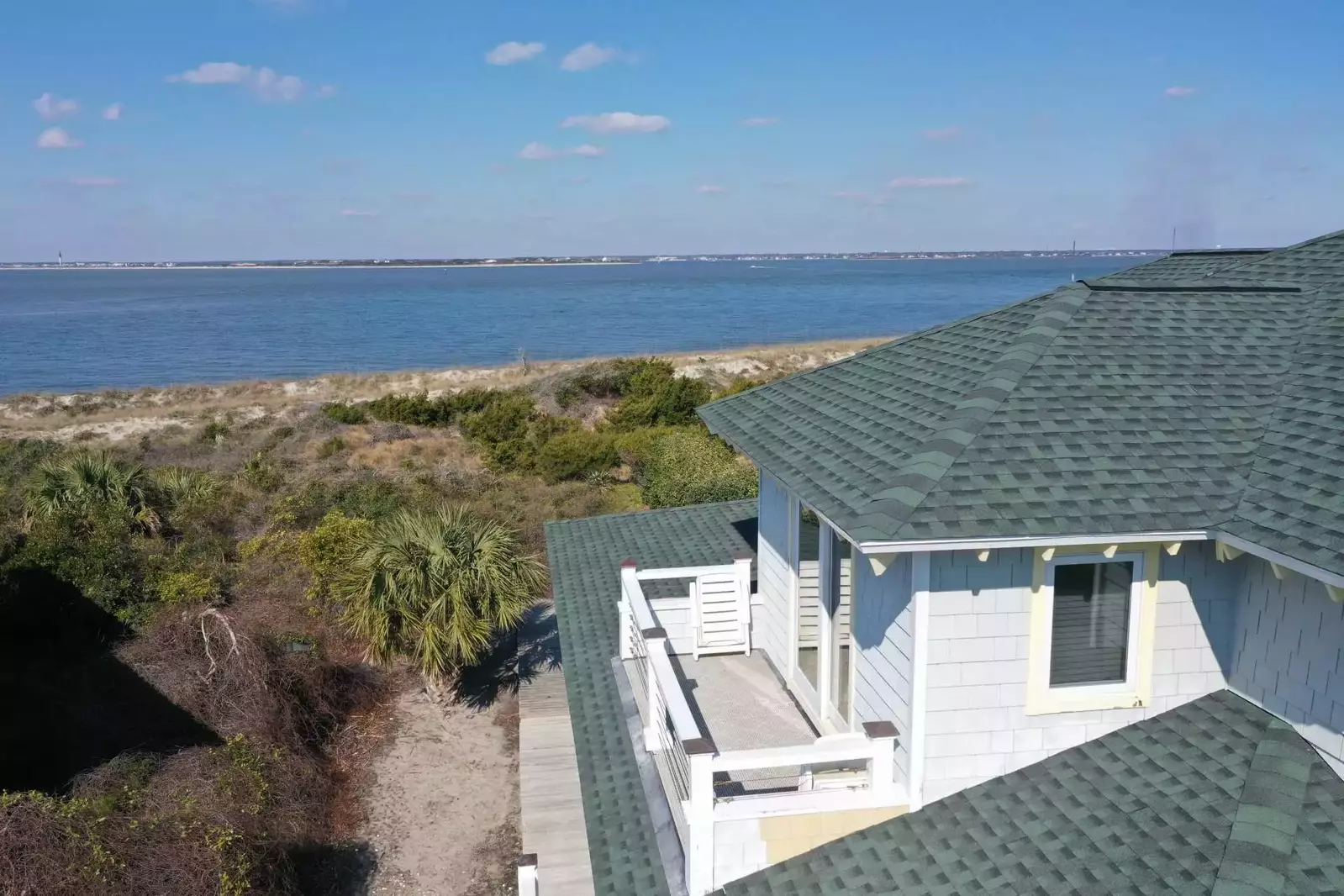 I just can't get over this beautiful view, can you? You can see the Oak Island Lighthouse from here