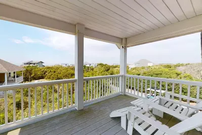 Relax on the top deck and read a book while listening to the ocean waves crash