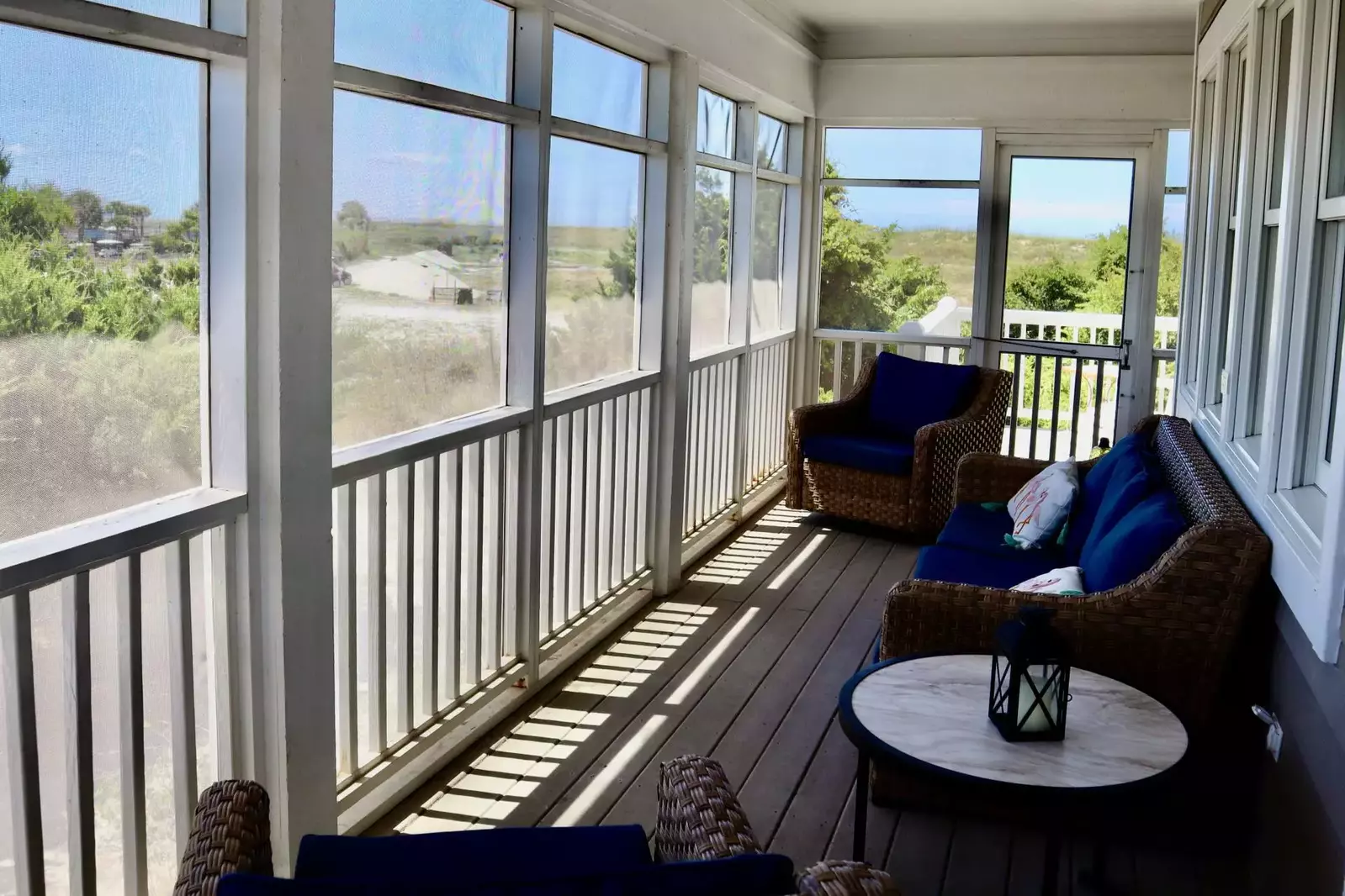 Sit in the screened in porch and watch the sunrise with some coffee or relax and watch the sunset after a long day at the beach!