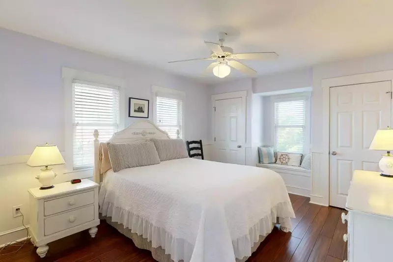 The second 1st floor owner suite has a Queen bed and a nice reading nook also