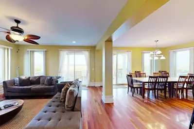 Spacious living and dining area with plenty of seating for everyone