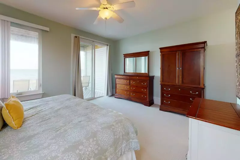 Top floor owners suite has 3 large dressers with a smart TV