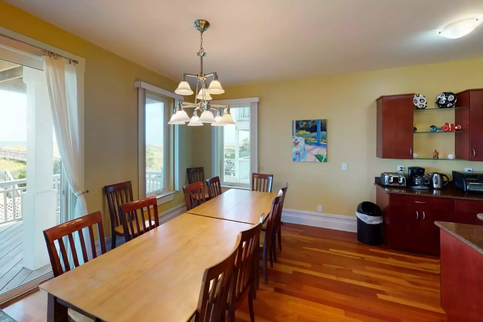 Very large dining table to enjoy meals at with an unbeatable ocean view!