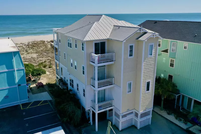 Dolphin Watch is the bottom floor with half the second floor