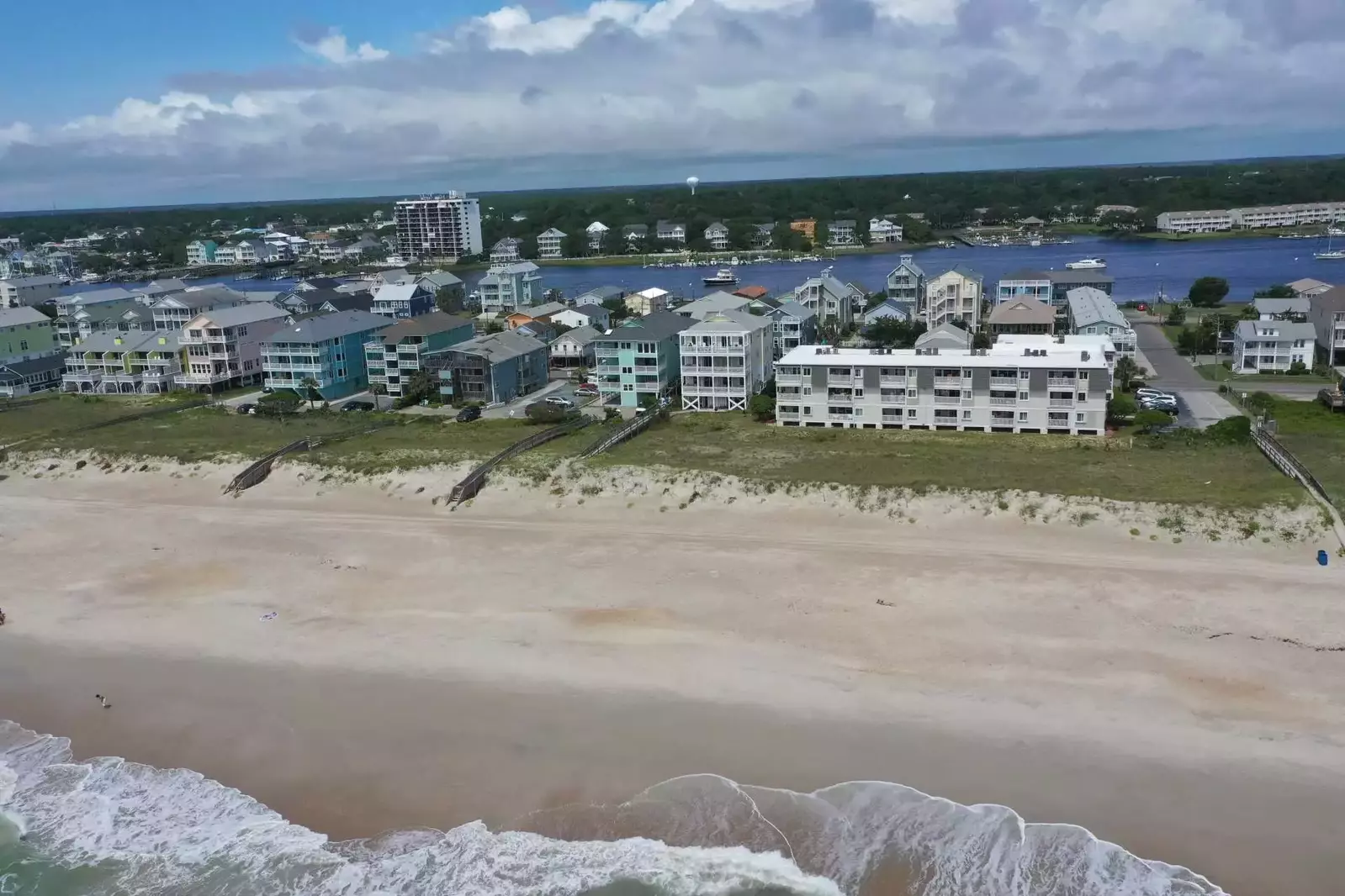 Sand, sand, sand!! Plenty of sand to enjoy beach activities on in front of Dolphin Watch