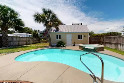 Relax around the pool on a hot day!  Tipsea Toes has a fenced in back yard for extra privacy (Spa and pool are not heated)