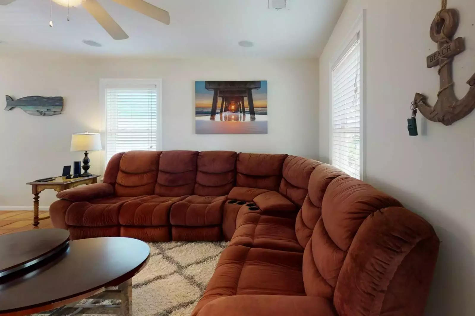 Relax on the large couch and watch a movie on the large Smart TV