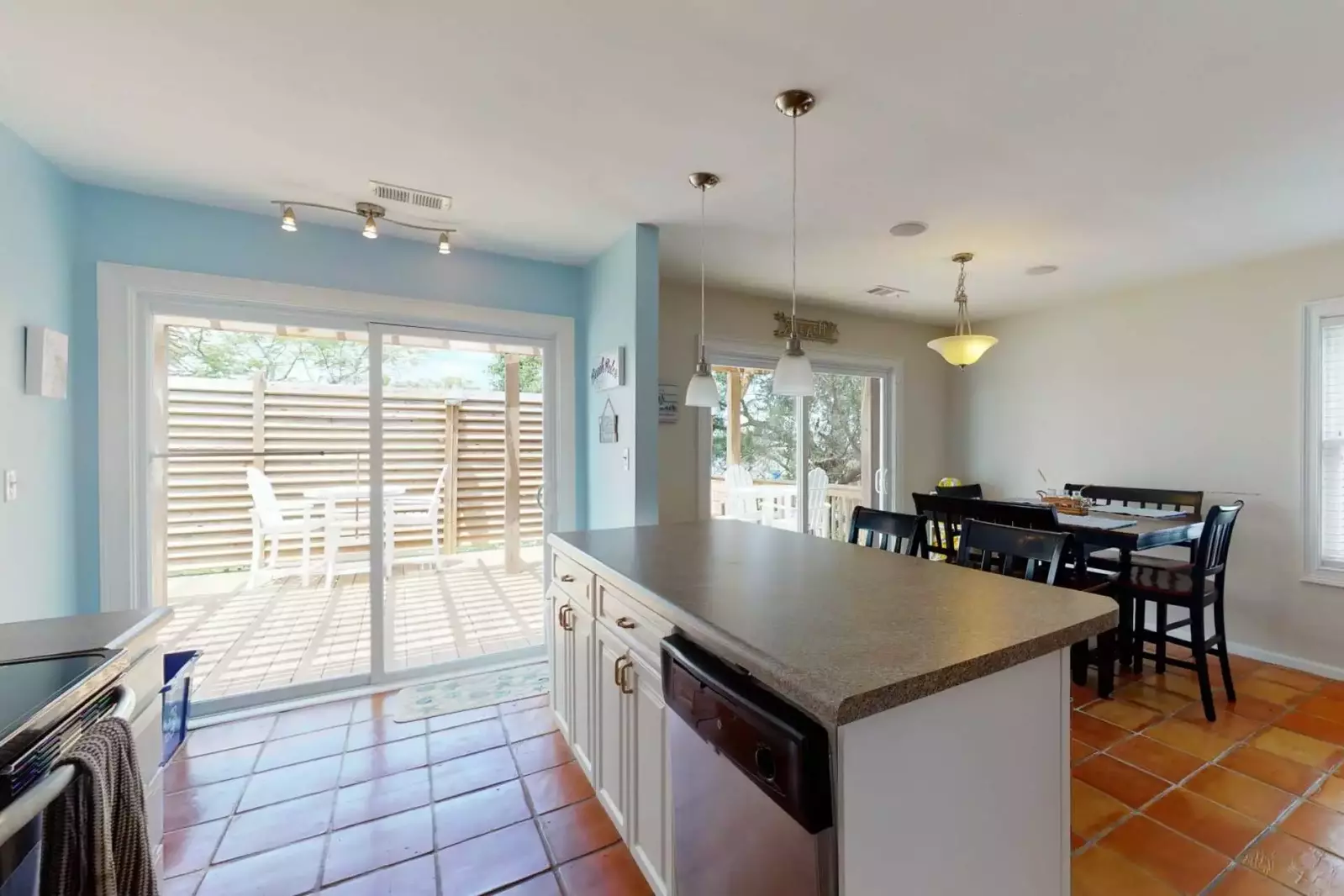You will have easy access to the pool and the deck through either of the large sliding doors