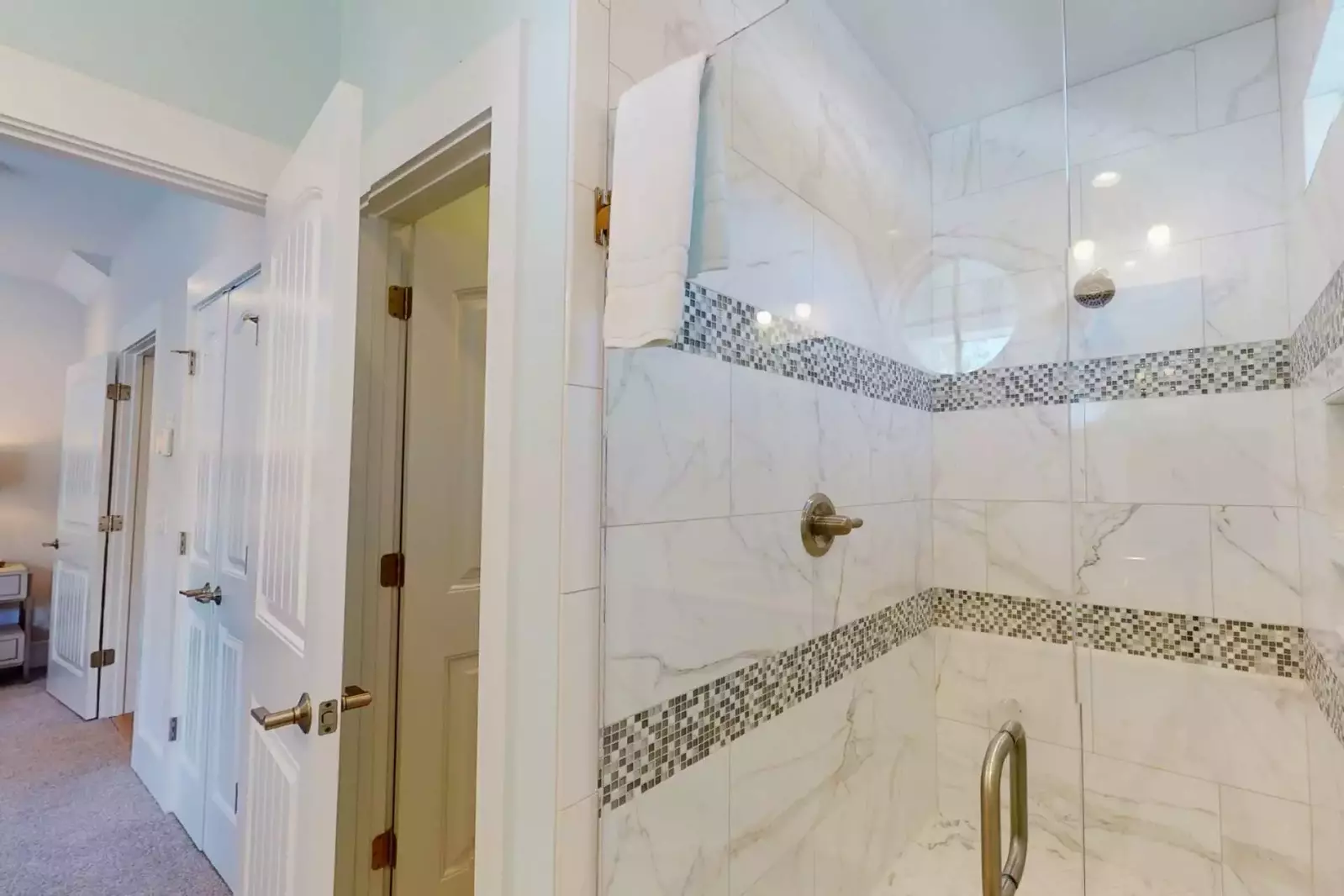 Enjoy the large tiled shower space in the master