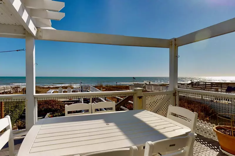 Sip your coffee or a cocktail while enjoying the sights and sounds of the ocean