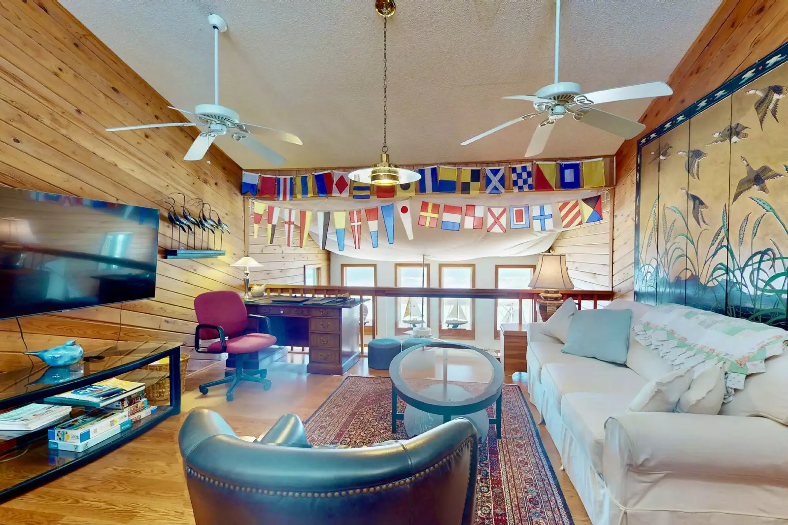 Hang out in the loft and catch a game or get some work done at the desk