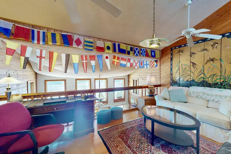 Take in an ocean view from the upstairs living area and desk