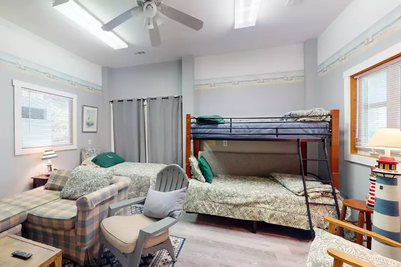 The bunk room has 3 twin beds