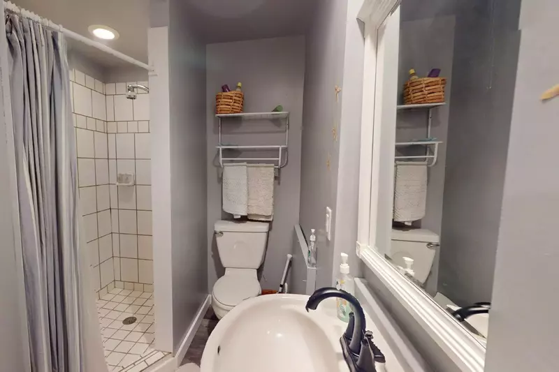 The ground floor full bathroom has a walk in shower