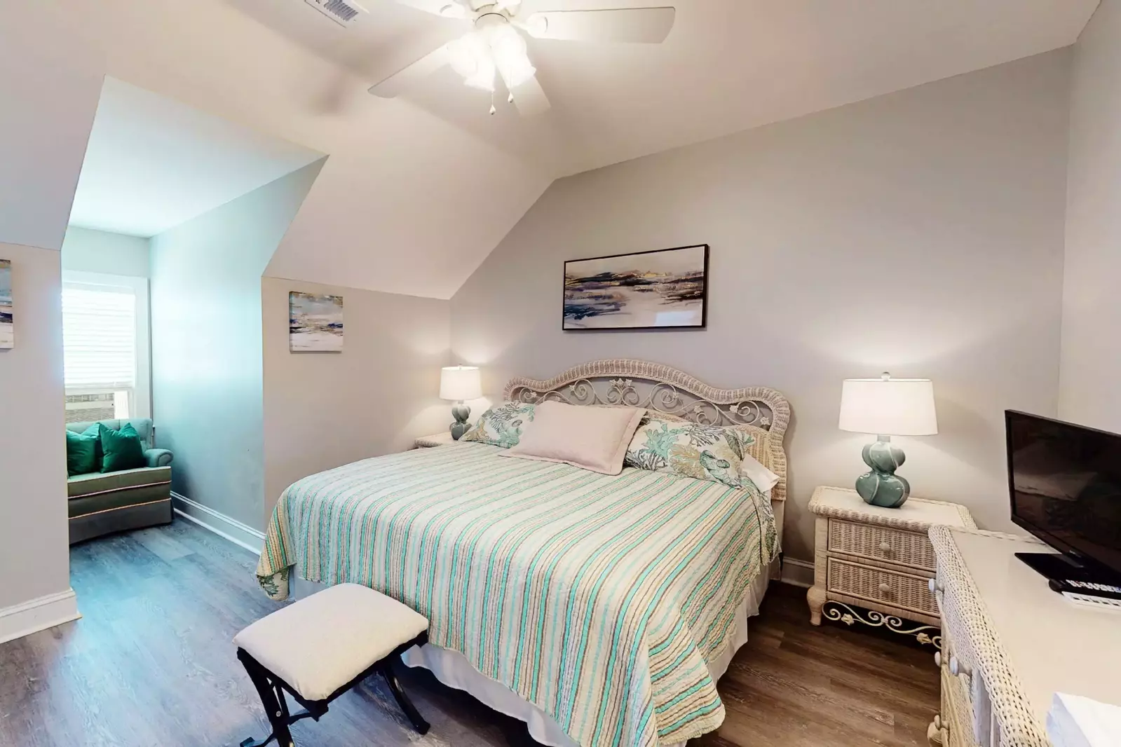 3rd bedroom top floor has a king bed and sitting area