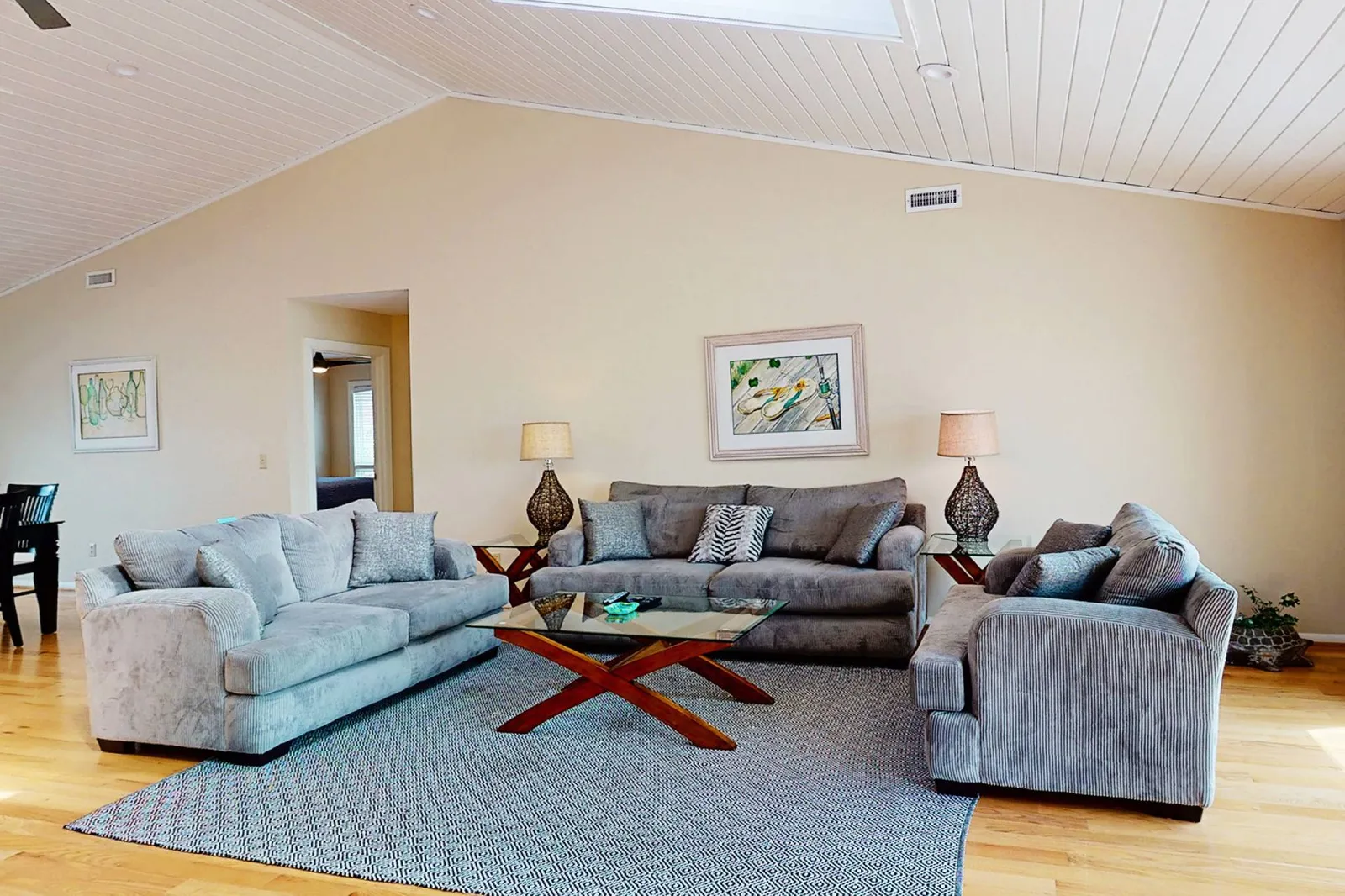 Relax on one of the three couches in the living room