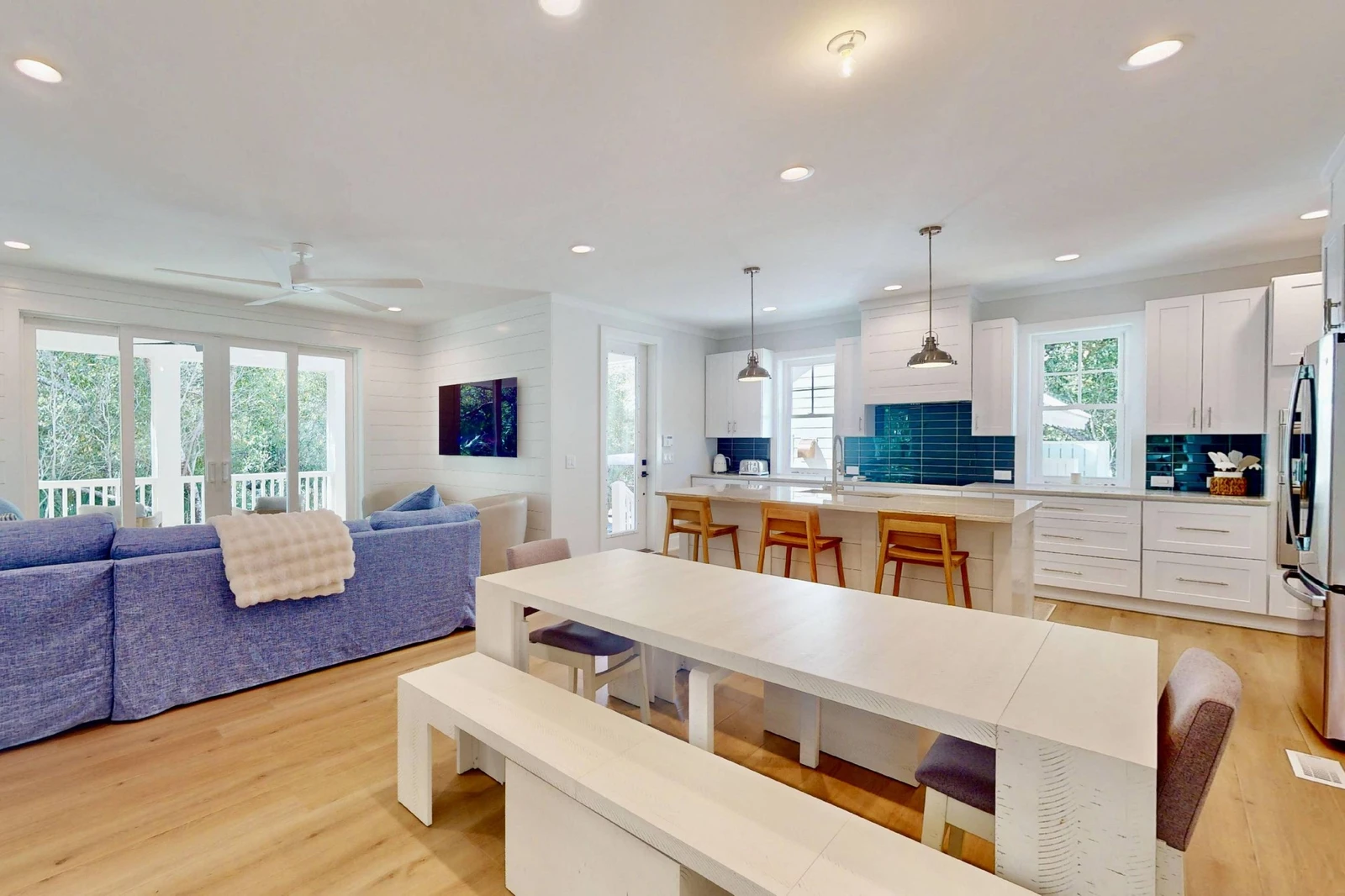 Gather around the large dining table for a family meal