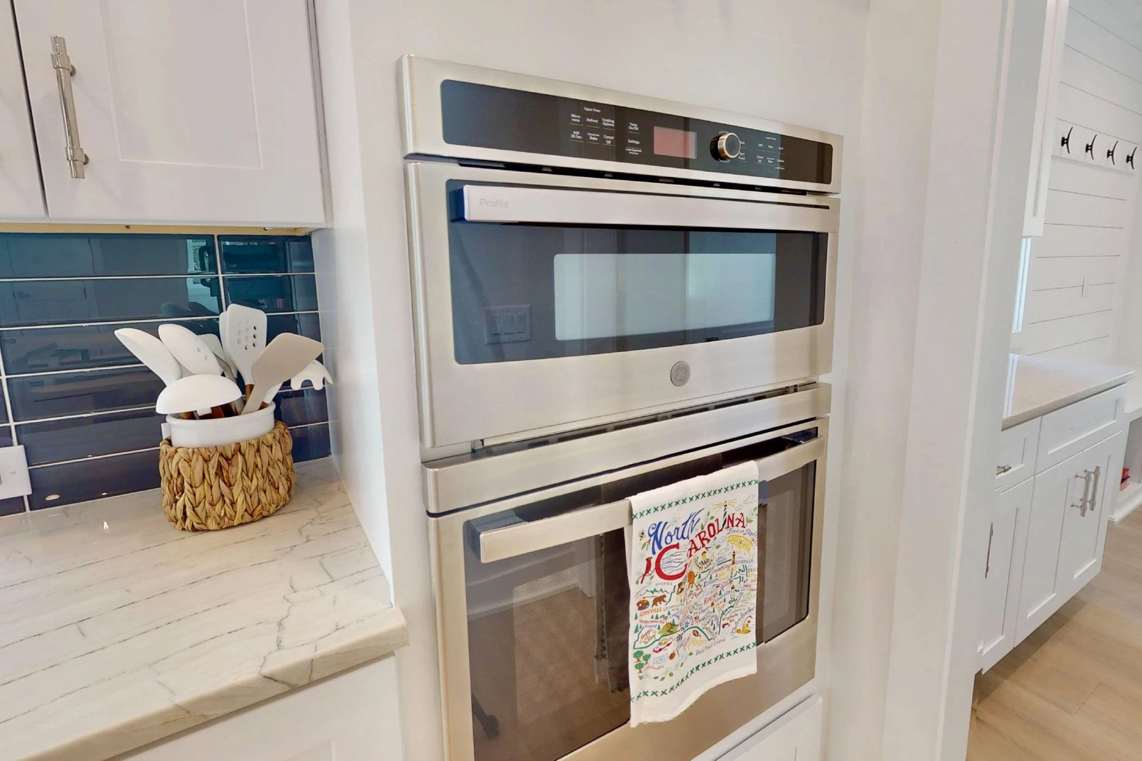 The kitchen features double convection ovens
