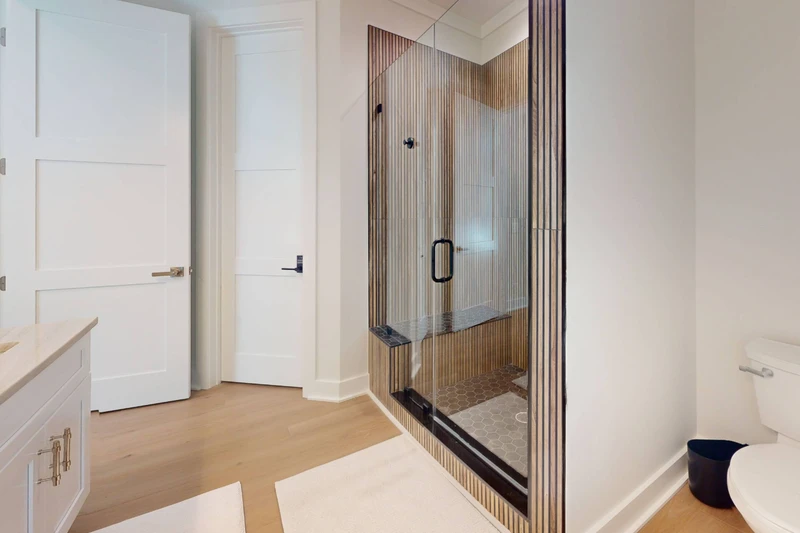 1st floor ensuite has a walk in shower with seat