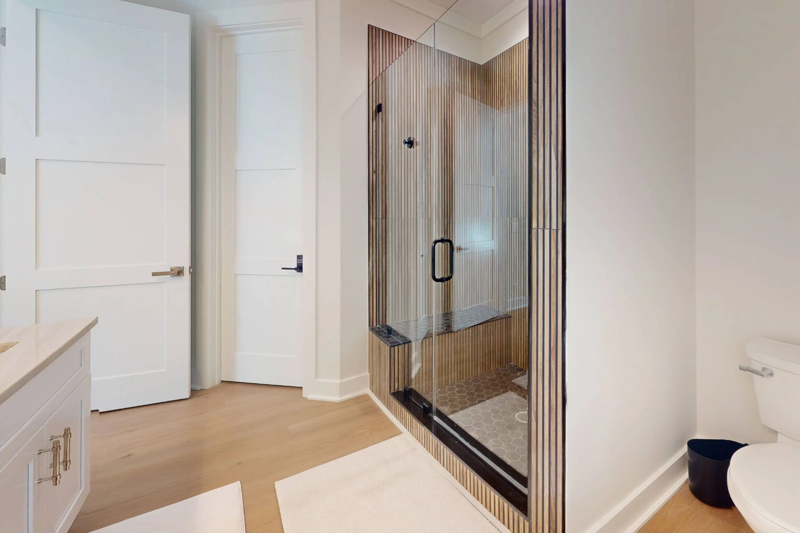 1st floor ensuite has a walk in shower with seat