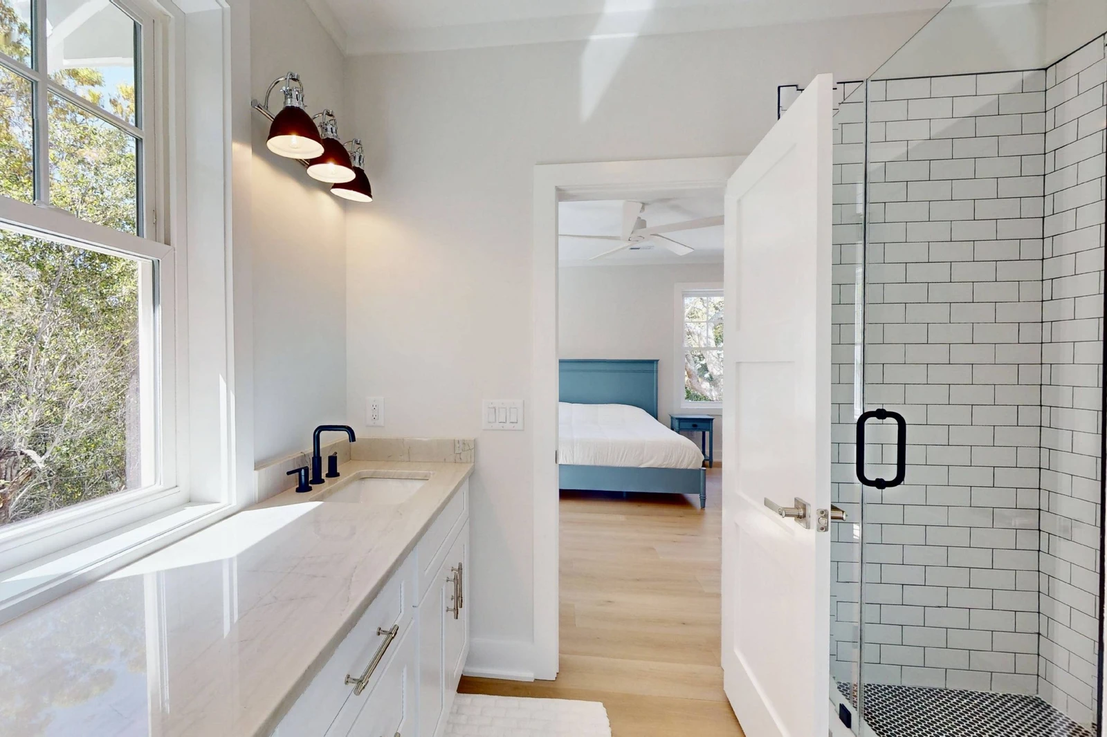 The upstairs ensuite features a large walk in tiled shower