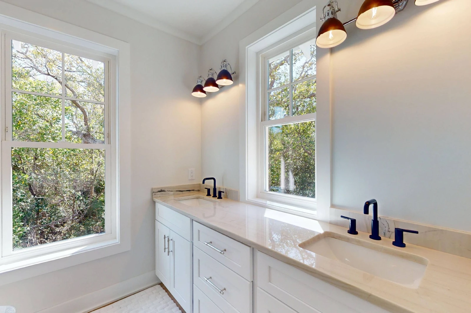 The upstairs ensuite has double sinks and plenty of counter space