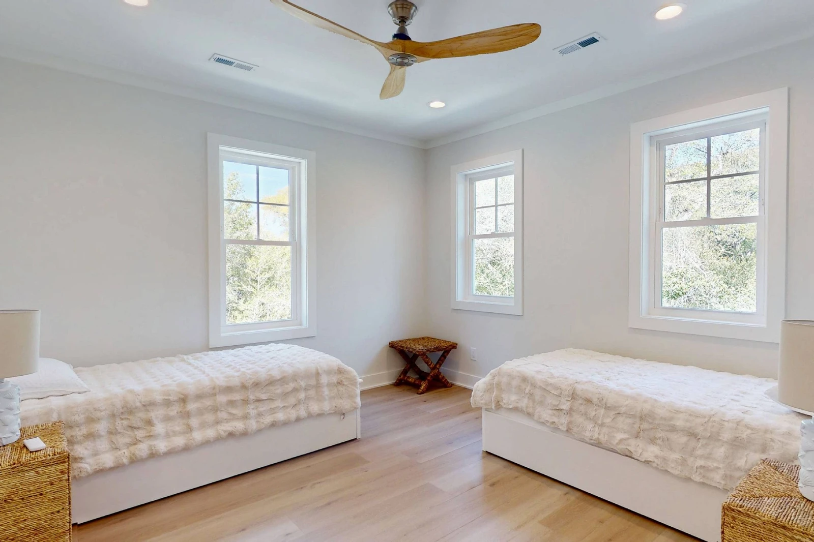 This bedroom offers two XL twin beds with XL twin trundles underneath - 4 beds total