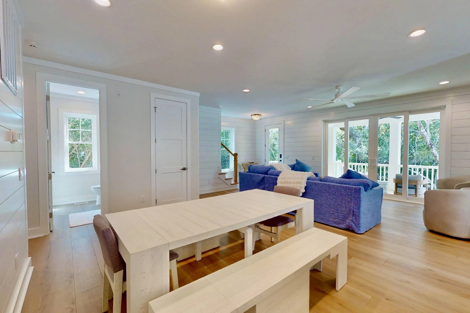 A half bathroom is easily accessible from the main living and dining areas