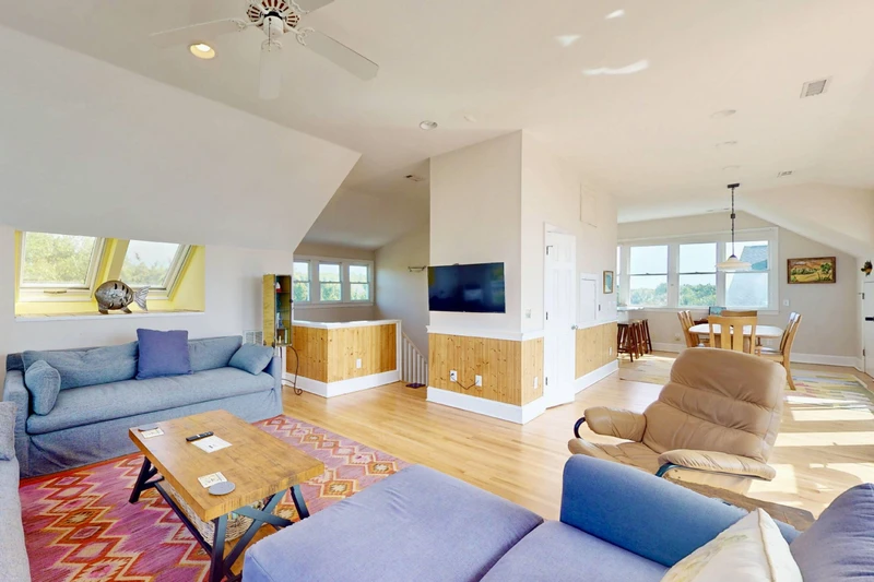 The bright, open floor plan allows a space for everyone