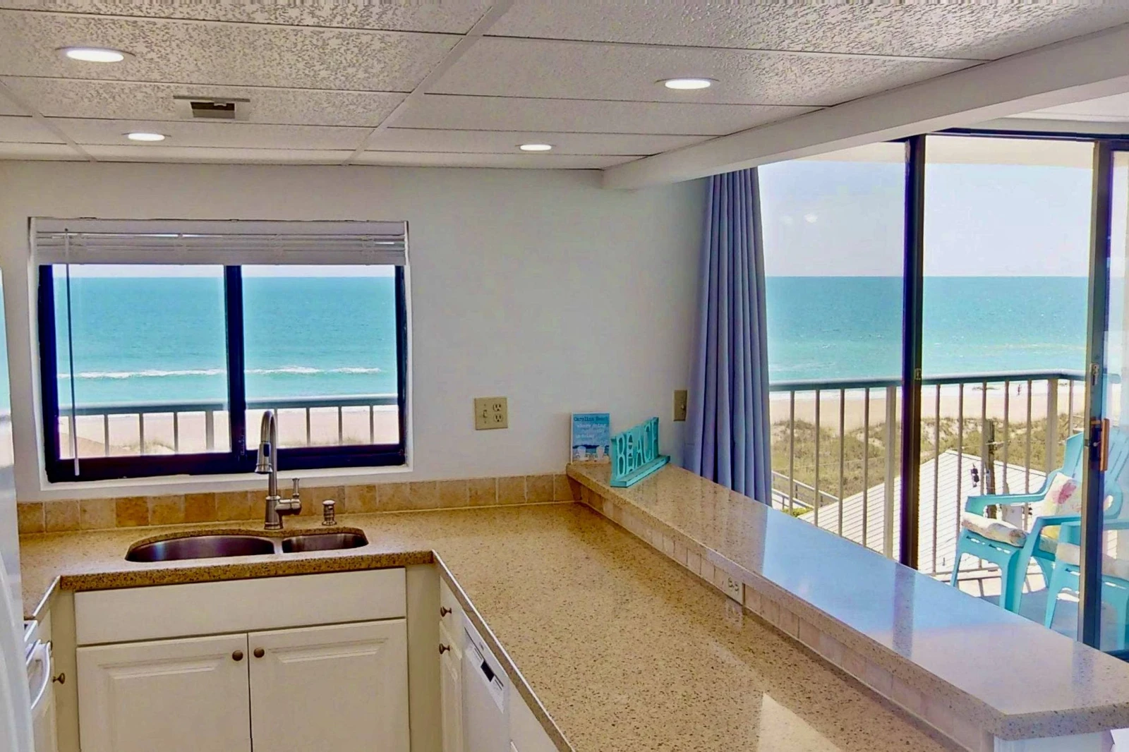 Watch the ocean while cooking or doing the dishes
