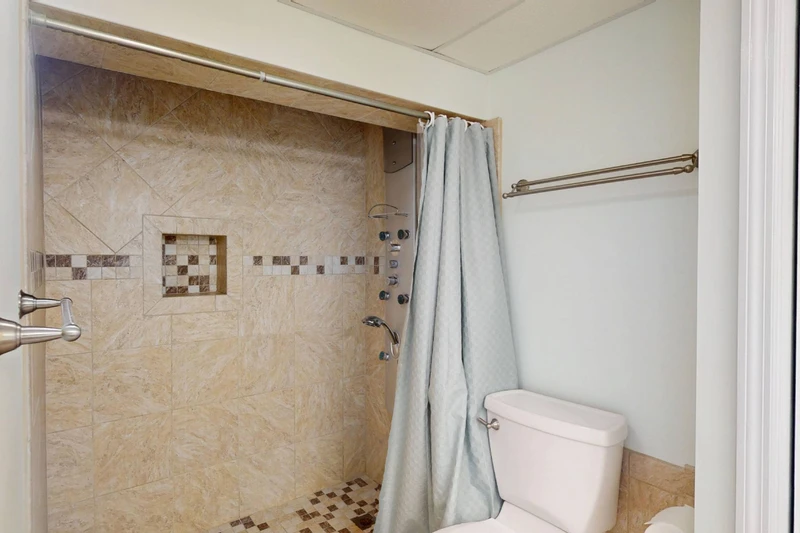 The owner's ensuite has a large walk in shower