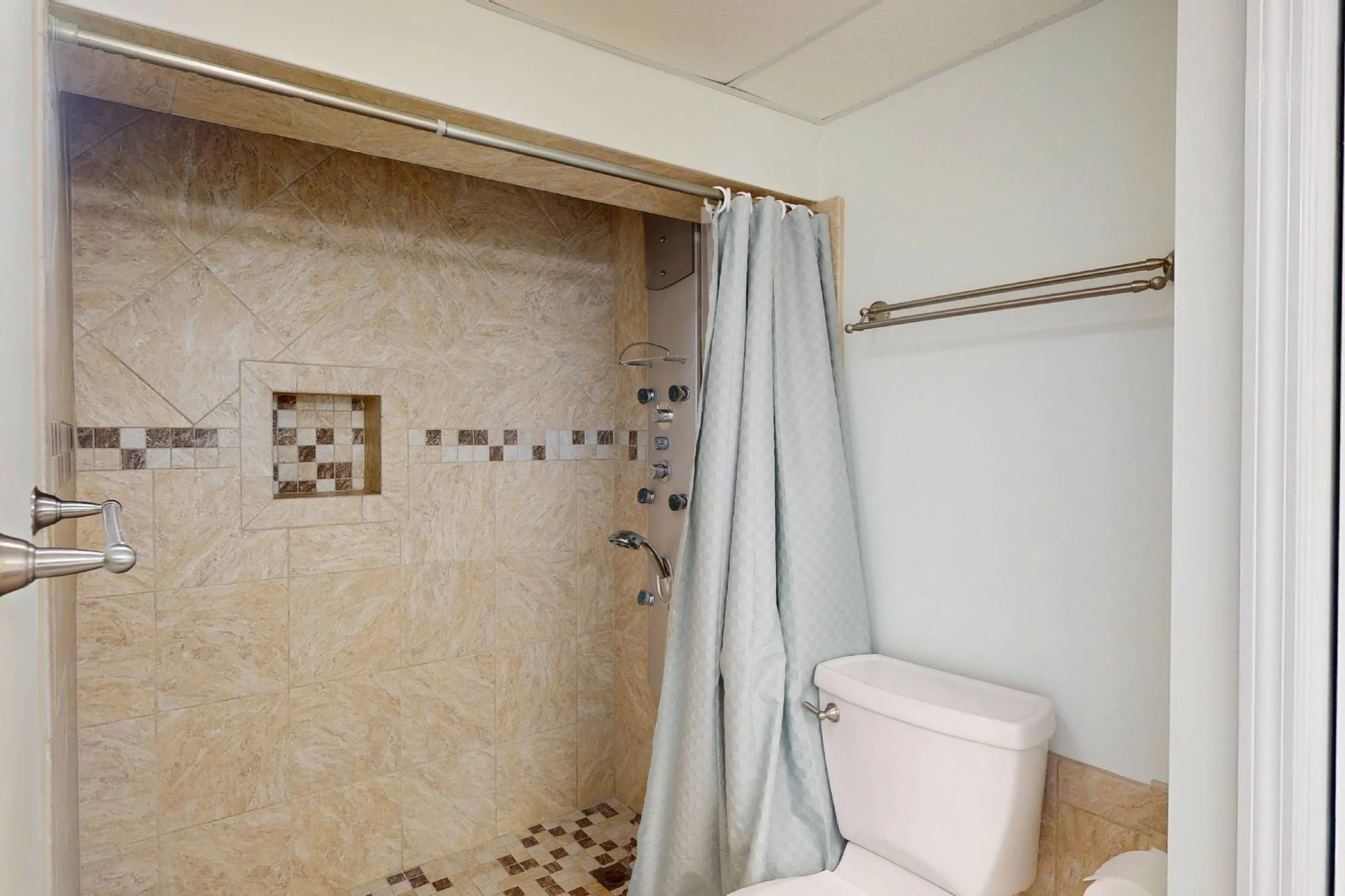 The owner's ensuite has a large walk in shower