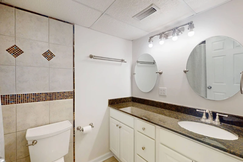 The hall bathroom offers plenty of counter space and a tub/shower combo