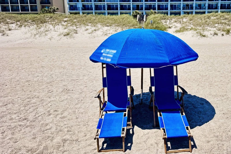 Two Beach Chairs + Umbrella included and delivered to beach in front of unit from April - September