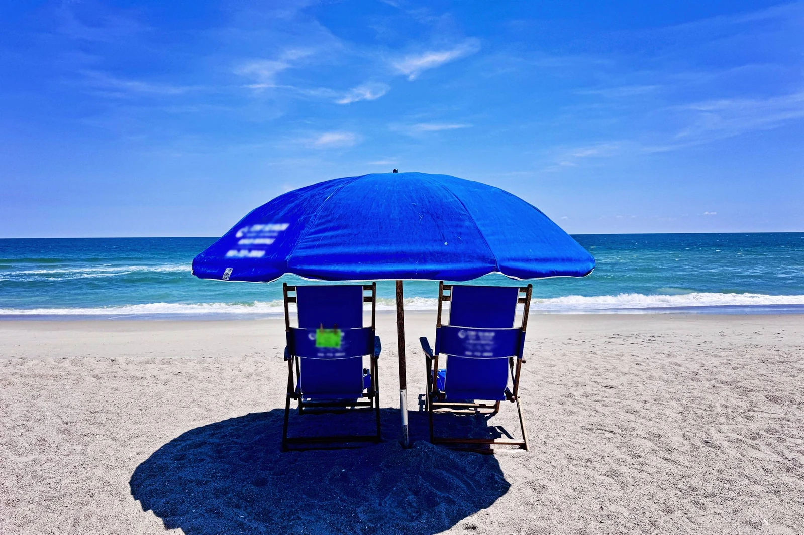 Two Beach Chairs + Umbrella provided and delivered to beach from April - September
